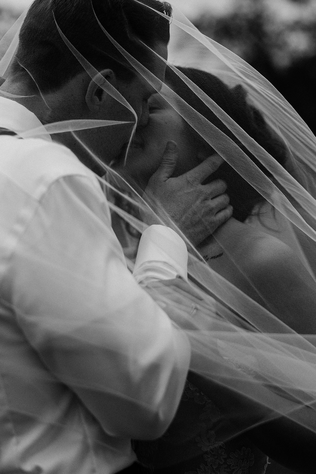A bride and groom kissing after the ceremony at Sterling Event Venue.