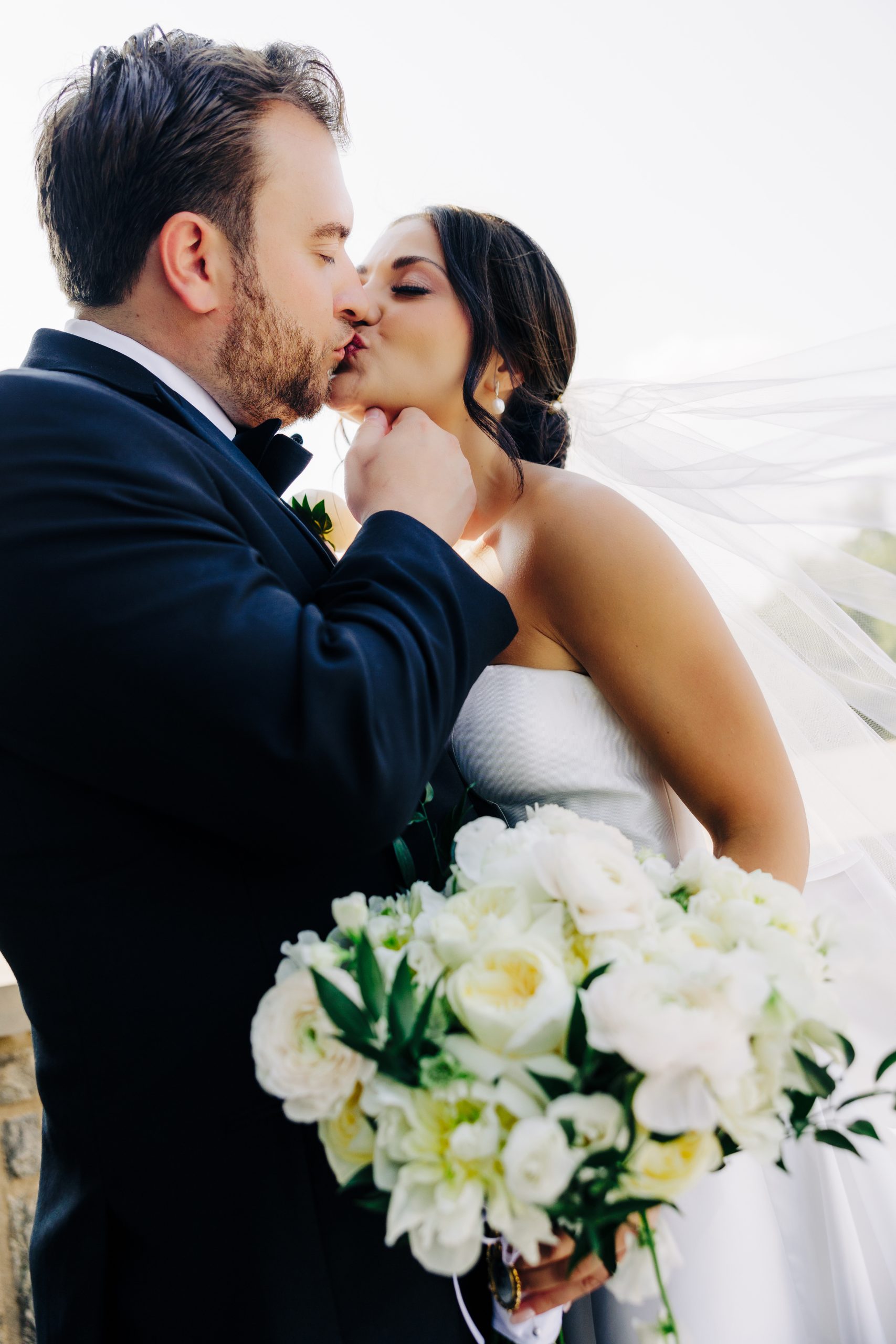 Groom and groom kissing after ceremony in Orlando, Florida